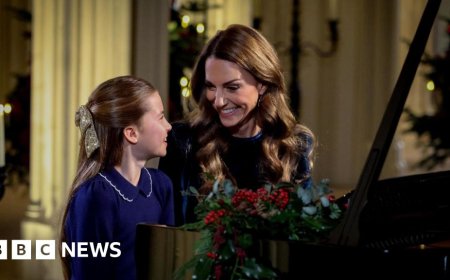 Catherine and Charlotte perform piano duet for Christmas carol concert