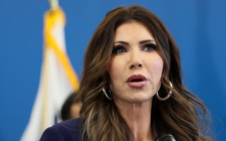 Defiant Protesters Face Noem After ICE Shooting: ‘We Have To Be Here’