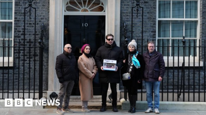 Family of UK couple held in Iran take petition to No 10