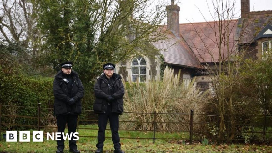 Andrew in custody as police search two addresses