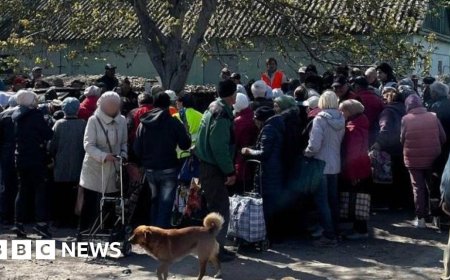 To stay or risk the 'Road of Death' - Ukrainian civilians trapped in frontline city