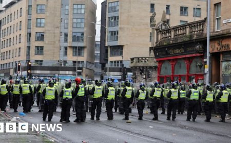 Riot police deal with 'serious disorder' as Celtic fans celebrate Premiership title win