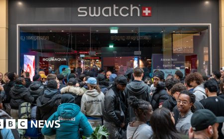 Massive queues shut Swatch stores as hundreds clamour for £335 limited edition watch
