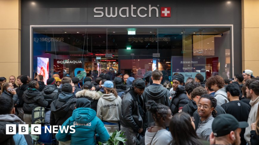 Massive queues shut Swatch stores as hundreds clamour for £335 limited edition watch